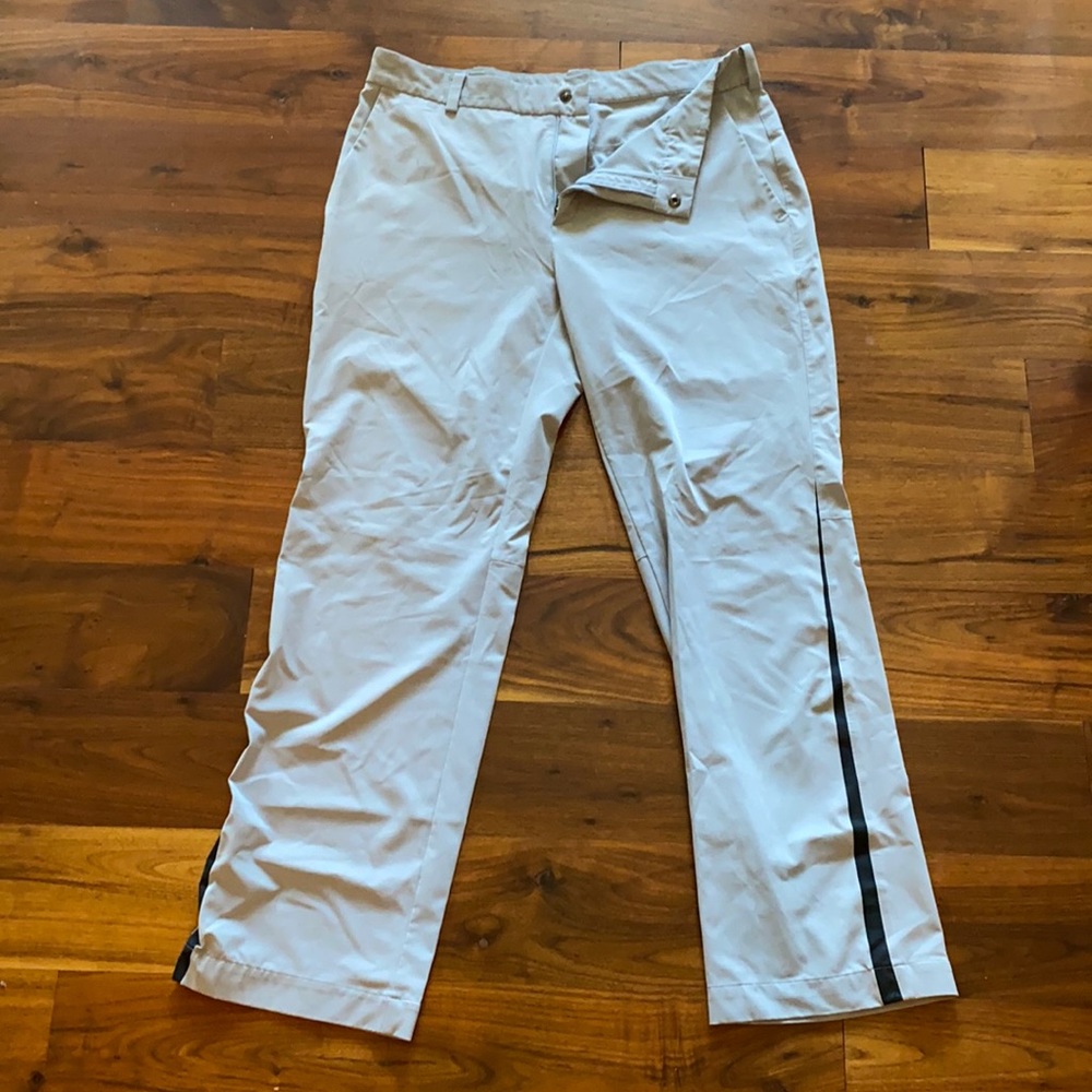 Nike grey and black golf pant. Minor marks on top of pant. 34 x 30.